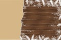 Winter background with snowflakes on dark wooden background with paper sheet. Royalty Free Stock Photo